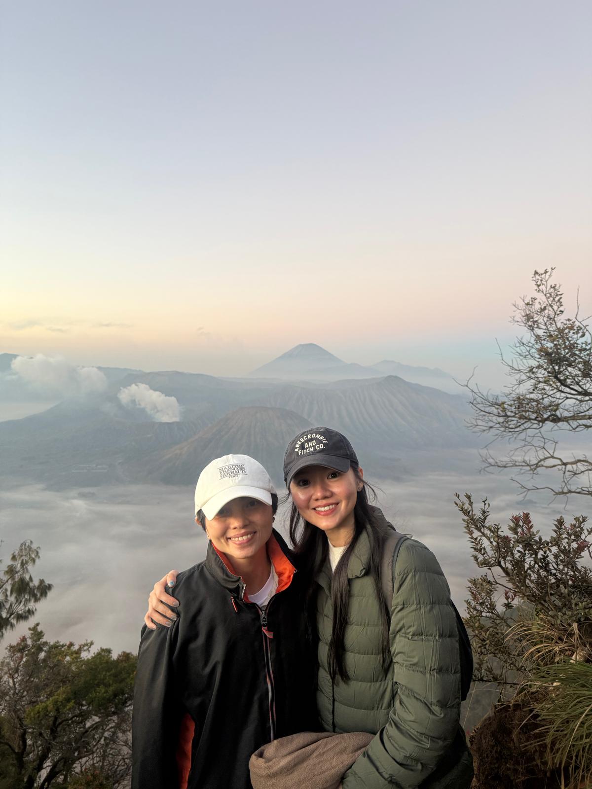 Two guests smiling at the Bromo viewpoint